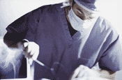 Photo: Performing Surgery