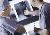 Photo: Surgeons consulting